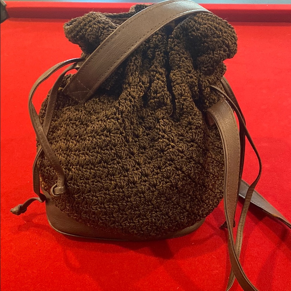 The Sak Brown Backpack with Leather Trim and Drawstring Closure